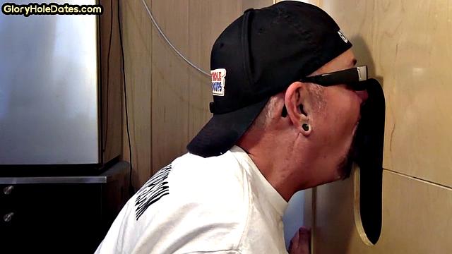 Gloryhole homemade DILF sucks black dong in closeup