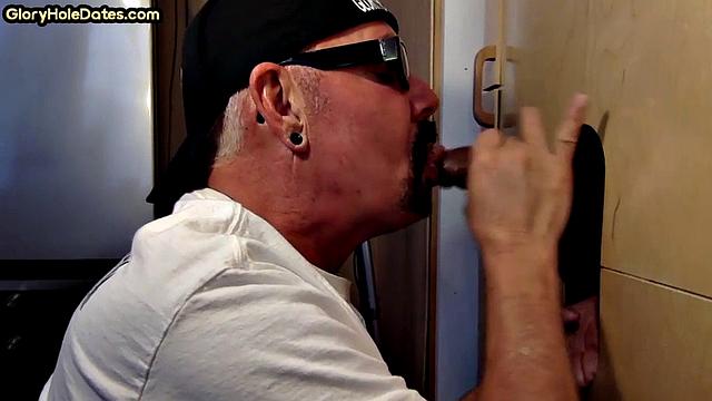 Gloryhole homemade DILF sucks black dong in closeup