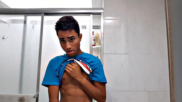 Little Lucas Prescott jerks off in the bathroom, once again stroking his uncut monster. Stand to see profiles of his huge cock.