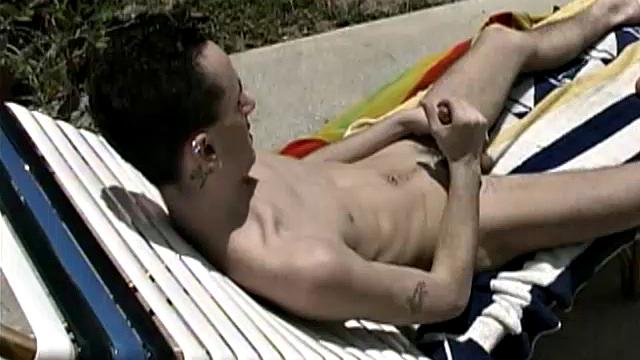 Cooling off in the pool, 19-year-old Garrett Brennan is horny and needs to relieve himself. After getting comfortable in a poolside lounge chair, he proceeds to stroke his throbbing uncut 7-inch cock until he releases his load into the air.