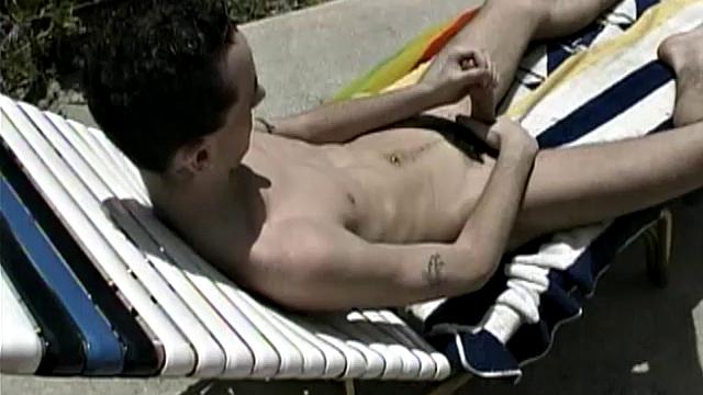 Cooling off in the pool, 19-year-old Garrett Brennan is horny and needs to relieve himself. After getting comfortable in a poolside lounge chair, he proceeds to stroke his throbbing uncut 7-inch cock until he releases his load into the air.