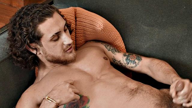 Solo athletic jock stroking his hard oiled cock