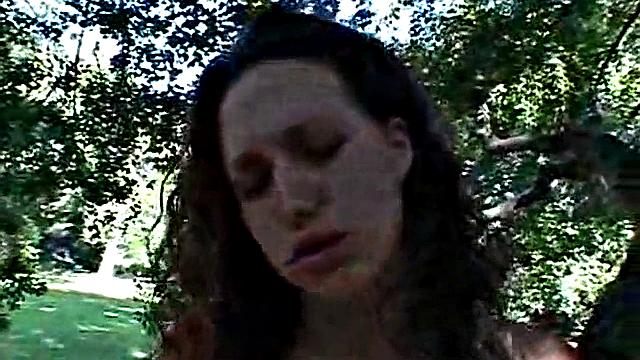 Two teenage lesbians licking each other's outdoors