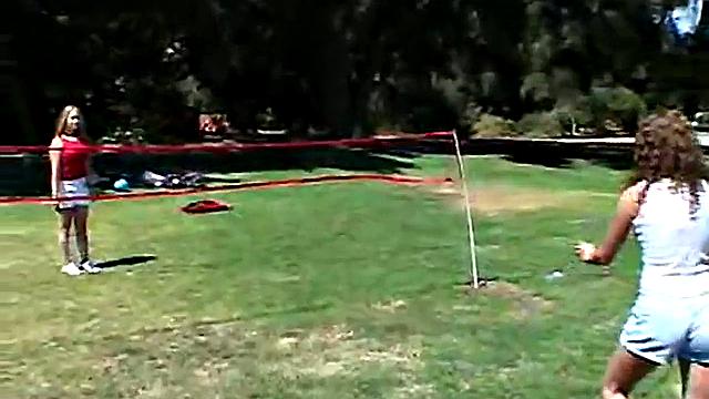 Two teenage lesbians licking each other's outdoors