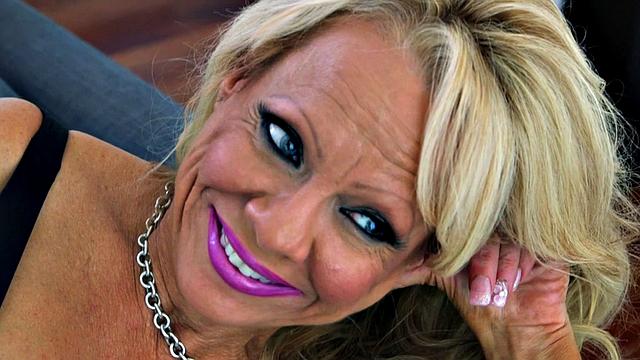 Big tits in fishnet stockings