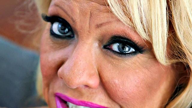 Big tits in fishnet stockings