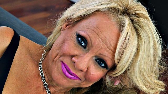 Big tits in fishnet stockings