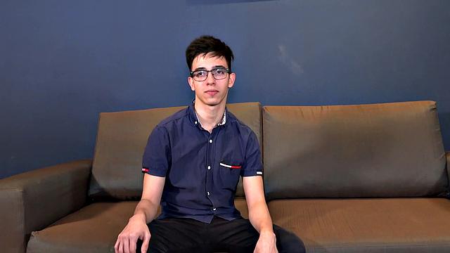 Antu is parked on a sofa, where he slowly strips to his underweat. The young Latino pulls his cock out the leg of his boxer briefs and plays with it for a bit, before getting totally naked. Antu fingers himself, as he works on getting hard.