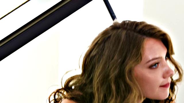 Curly-haired beauty in high heels enjoys solo play with her pussy and high heels