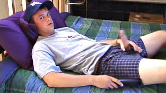 Connor strokes his thick cock and moans with every touch