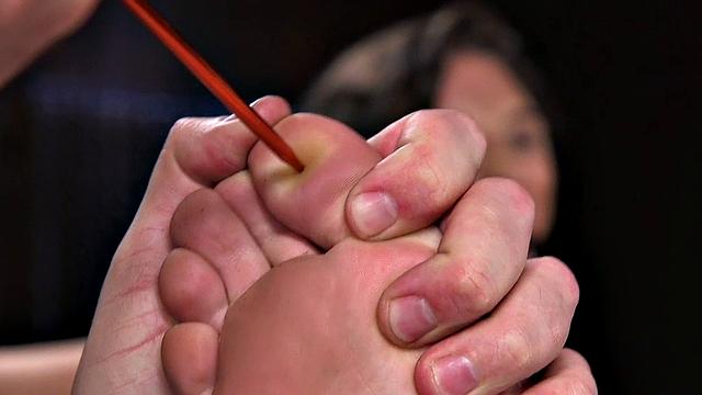 Pissing ballgagged sub suffers tormenting by master