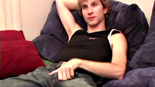 Amateur Jenson McGill rubs his crotch while watching porn, strips off clothes to stroke stiff cock & cum on face