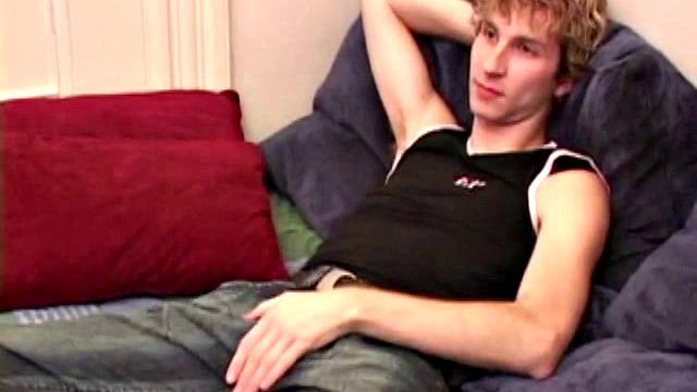 Amateur Jenson McGill rubs his crotch while watching porn, strips off clothes to stroke stiff cock & cum on face