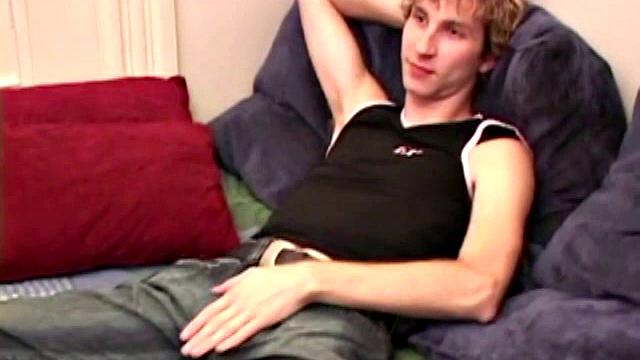 Amateur Jenson McGill rubs his crotch while watching porn, strips off clothes to stroke stiff cock & cum on face