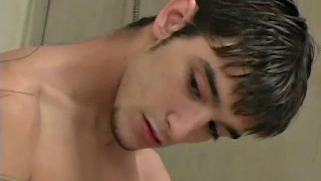 In this solo jerk off scene, Felipe Pietro's huge uncut cock dangles between his legs as he showers. He dries off and strokes his meat to full on a countertop, next to the mirror.