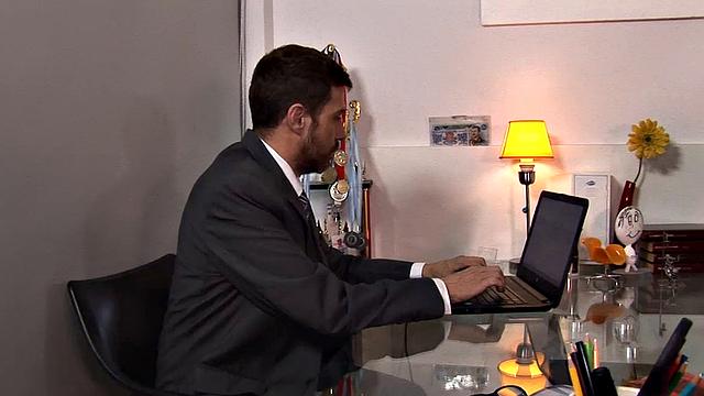 One of the Latino employees has screwed up on the job and daddy Andres needs to give the boy some schooling. With young Allen at his desk, Andres likes what he sees.