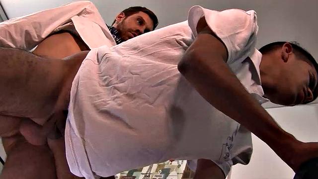 One of the Latino employees has screwed up on the job and daddy Andres needs to give the boy some schooling. With young Allen at his desk, Andres likes what he sees.