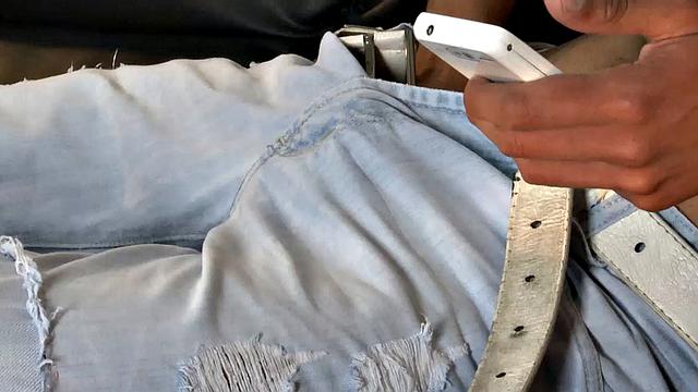 Our featured solo boy of the week is Adrian, who sits on a sofa and starts looking at porn on his phone. With the shirt off and pants unzipped, he takes hold of his growing uncut cock.