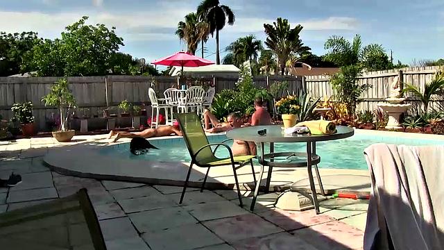 Horny men gathered around the pool as Victor Cody slides his cock up Eden Stone's ass in pig roast party