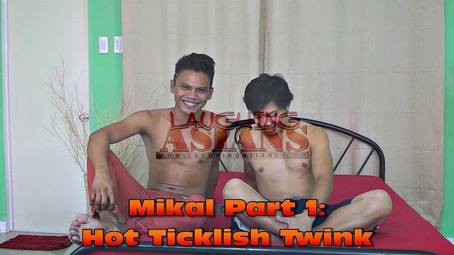 We welcome a new hot twink Mikal Rivera to our pool of Asian tickle boys. Our resident tickler has cute sexy Pinoy twink Mikal spreadeagled on the bed for his first male tickling experience.