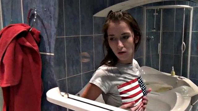 Cute teen masturbates in hot shower scene