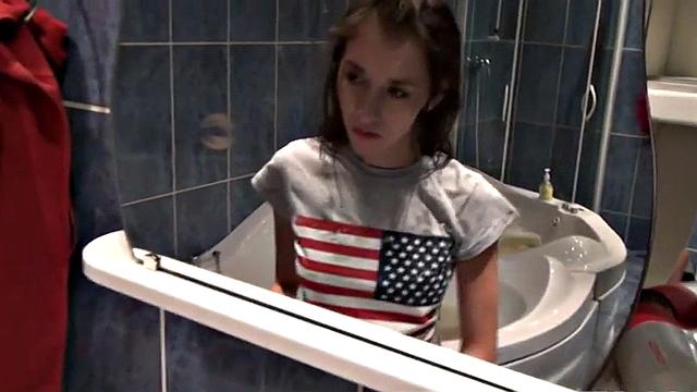 Cute teen masturbates in hot shower scene