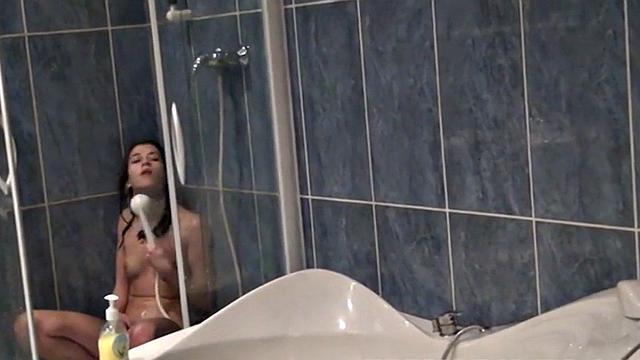 Cute teen masturbates in hot shower scene