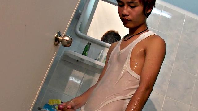 Real pissing Asian twink wanks cock in solo action to cum