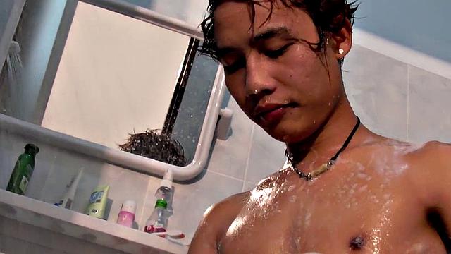 Real pissing Asian twink wanks cock in solo action to cum