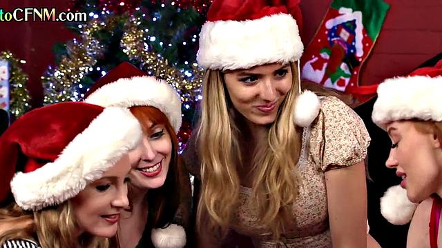 Xmas British dominas suck cock in group blowjob