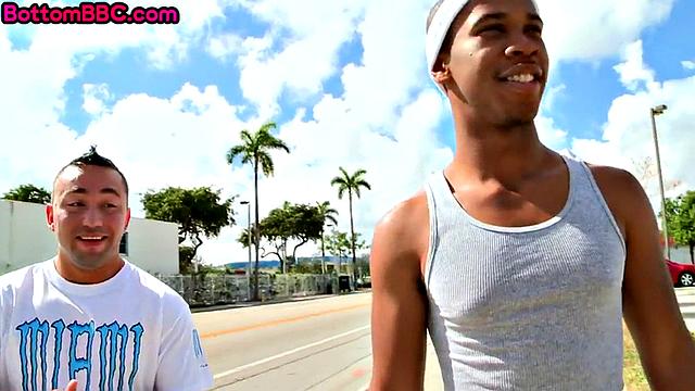 Pulling ebony deepthroated by a white cock