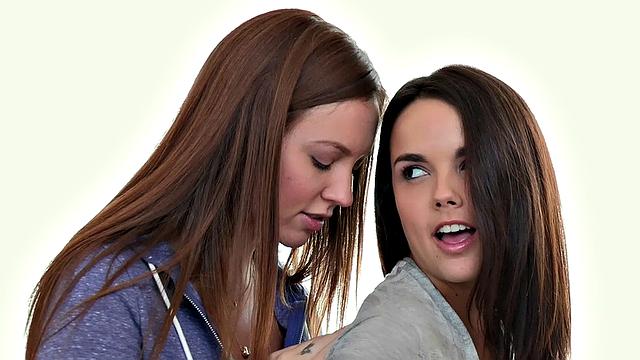 Redhead brunettes in stockings finger and kiss each other's trimmed pussies in the bedroom