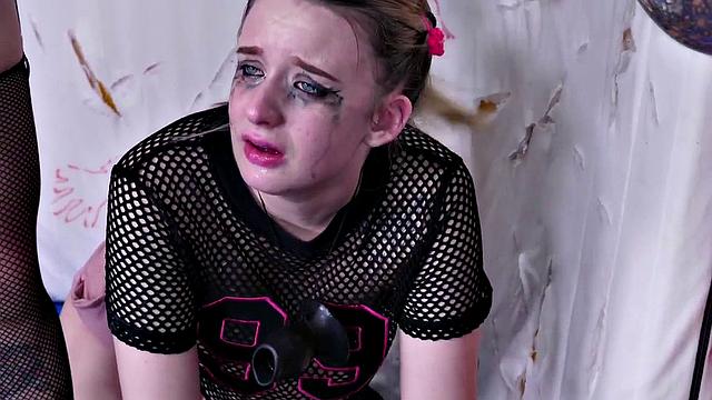 Lezdom teen slave gagging on dildos