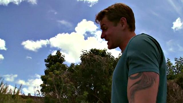 Amateur jock with tattoos takes a deep interracial pounding in public by a black top