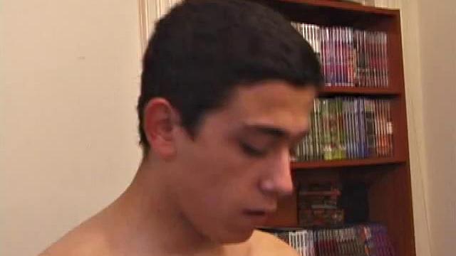 After stripping naked, Luciano gets hard and starts beating off. He swaps hands, while he strokes, and soon Luciano delivers a well-earned load, which he proceeds to lick up and swallow.