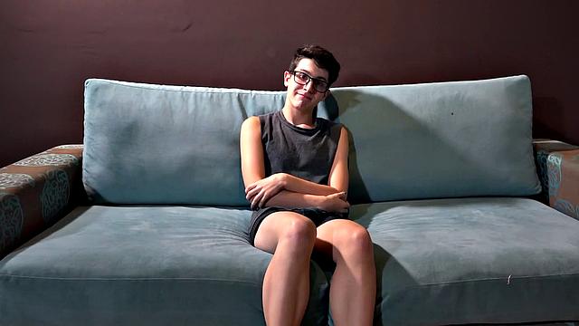 Phillip is a cute and nerdy looking Latin twink. After he strips naked, Giorgio joins him on the sofa and starts stroking the boy's big cock. Then Giorgio pushes his underwear down, so Phillip can suck his dick.