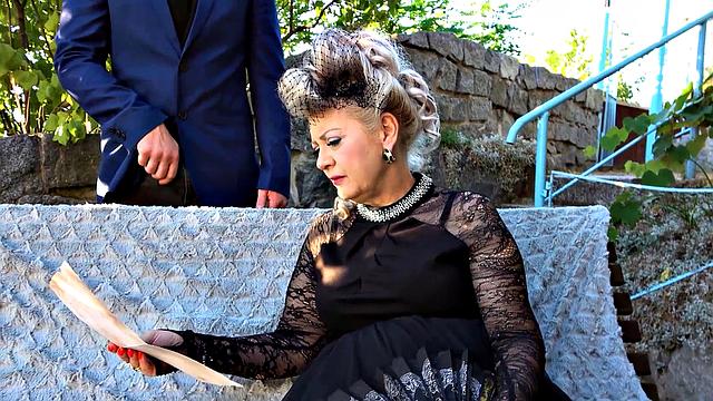 MATURE4K. Resting outside leads to fun for posh madame and man