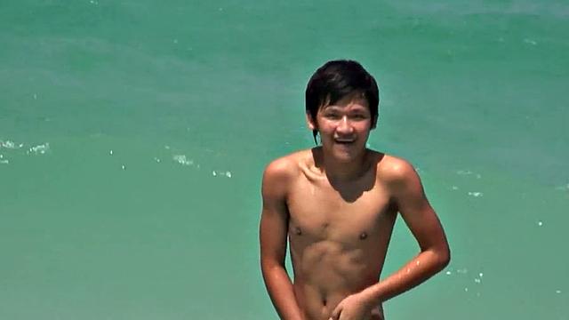 Pissing Asian twink fucks boyfriend's ass on vacation in hotel room