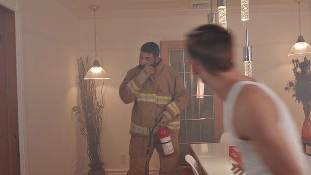 Inked firefighter jock fucks asshole of skinny twink