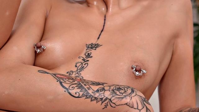 Pierced and inked WAM babe pussyfucked on massage table