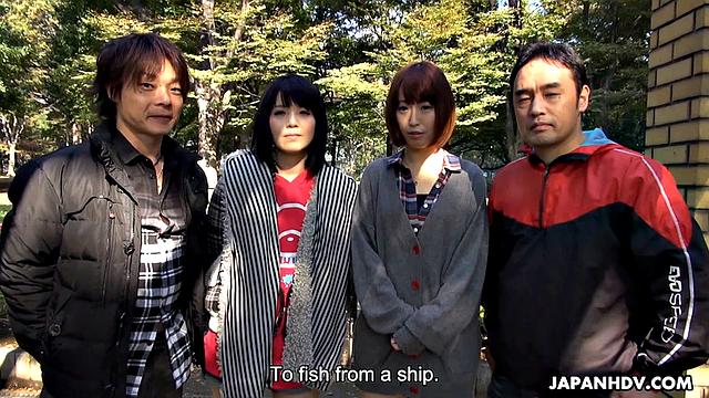 Sena Sakura sucks, rubs and licks fishing partner's cock
