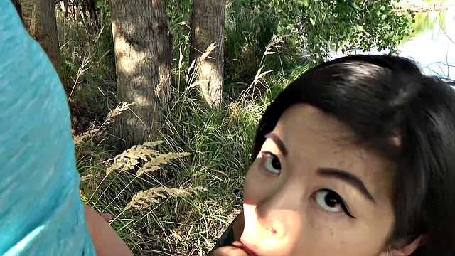 A tattooed Asian babe moan with pleasure as she gets girthy and takes it from behind