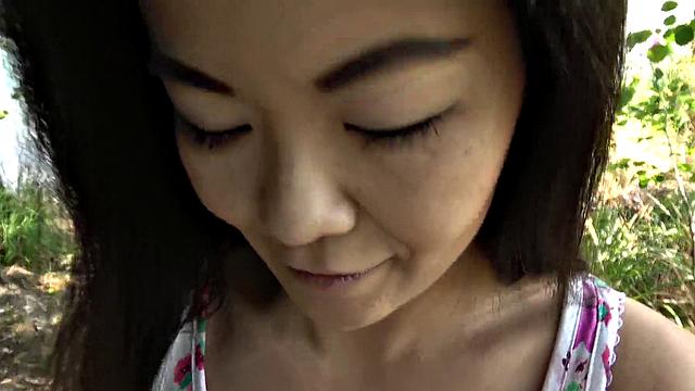 A tattooed Asian babe moan with pleasure as she gets girthy and takes it from behind