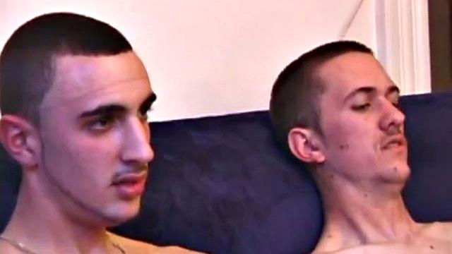 As amateurs Dion Monei and Casper Cox watch a porn video, they chat about the girls in the flick and rub their crotches. Clothes come off, cocks come out, and lube goes on.