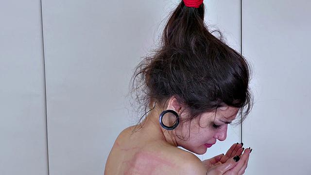 Watch Spin's tight body take a hard spanking while getting tied up & dominated