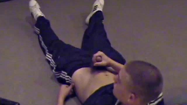 Lance pops a porn video in and pulls out his boner, then starts a nice long stroke shoe, getting himself close to climax several times. Once past the point of no return, he pumps out a nice cum load onto his belly.