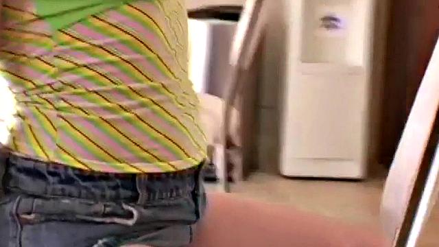 Pigtailed blond teen showing her big tits