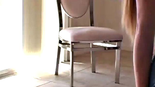 Pigtailed blond teen showing her big tits