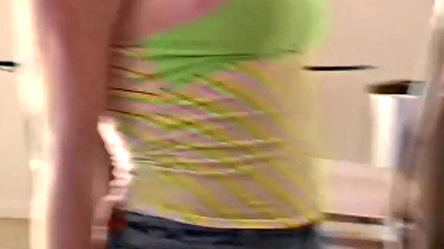 Pigtailed blond teen showing her big tits