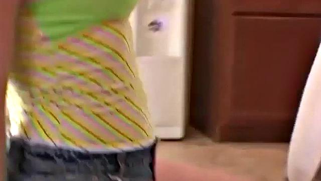 Pigtailed blond teen showing her big tits